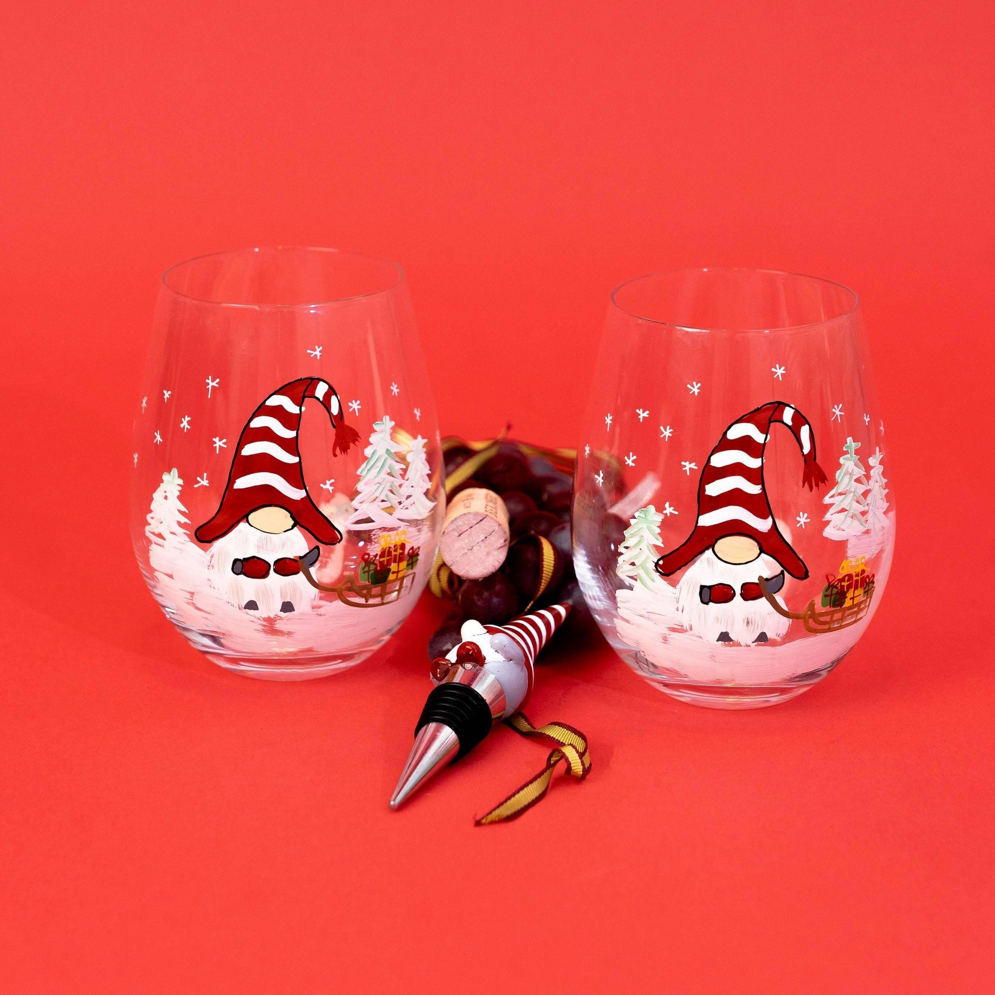 https://jerseyartglass.com/cdn/shop/products/jersey-art-glass-gnome-wine-glasses-set-of-2-painted-wine-glass-christmas-wine-glasses-winter-gnome-gnome-gifts-christmas-gnome-christmas-gifts-32394835067044.jpg?v=1699107626&width=1946