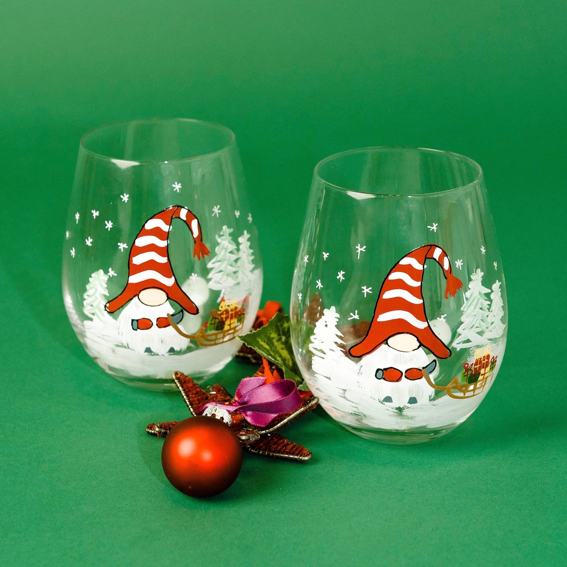 https://jerseyartglass.com/cdn/shop/products/jersey-art-glass-gnome-wine-glasses-set-of-2-painted-wine-glass-christmas-wine-glasses-winter-gnome-gnome-gifts-christmas-gnome-christmas-gifts-32394835656868.jpg?v=1699107626&width=1946